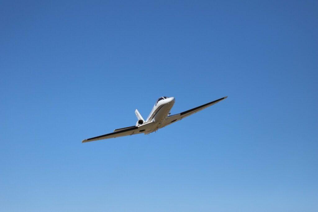Patrick Wright standing by a jump plane