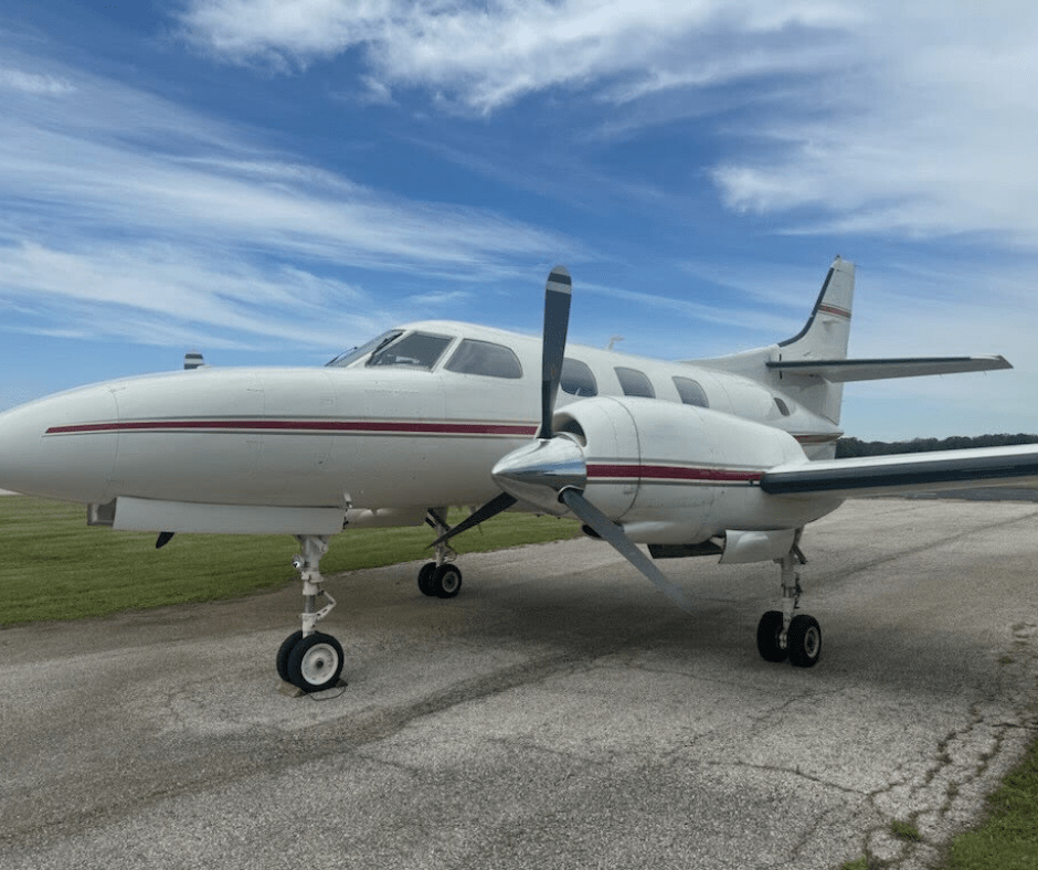 Phillip Sizemore standing by a jump plane