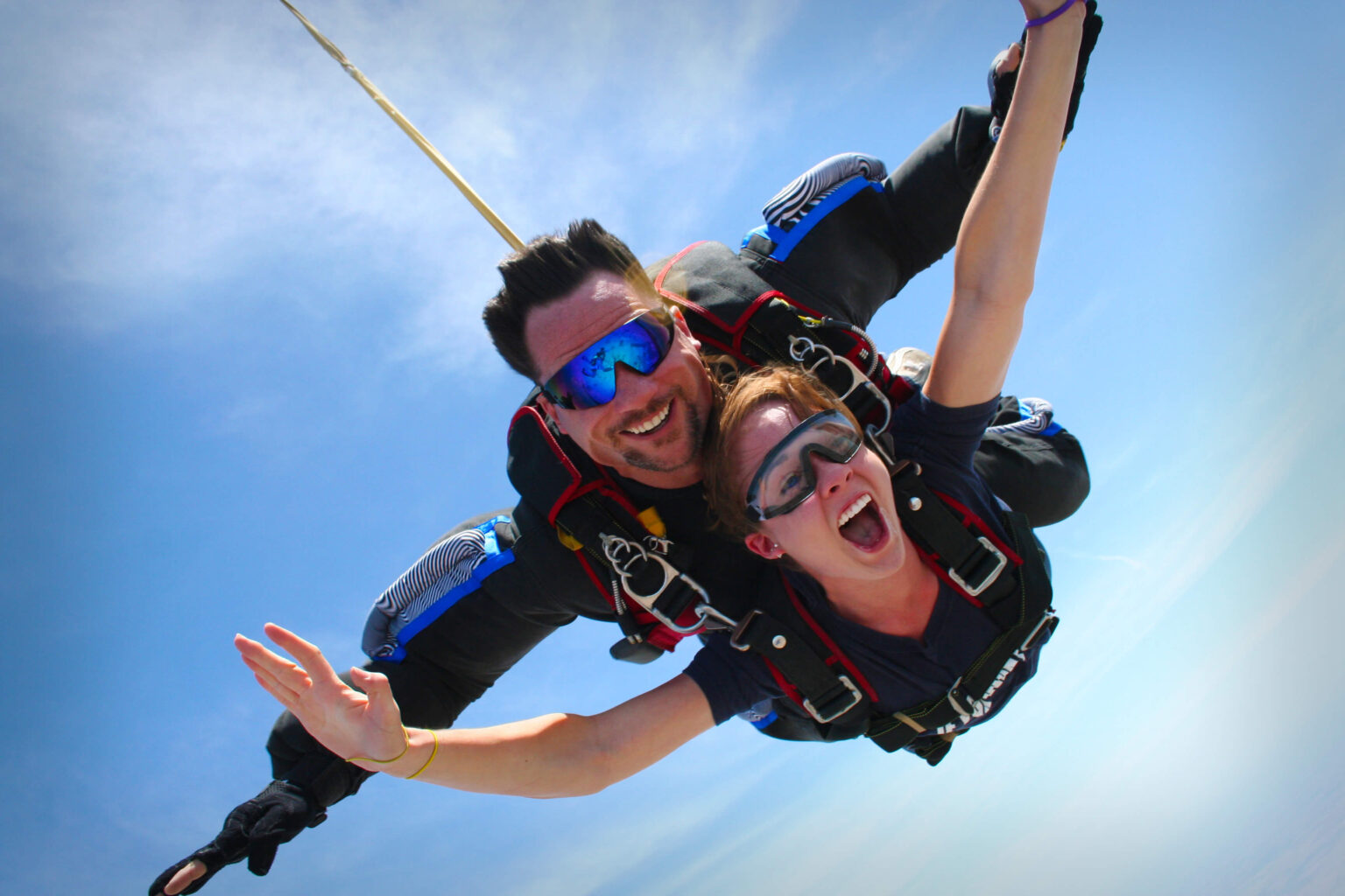 Skydiving closeup smiling couple